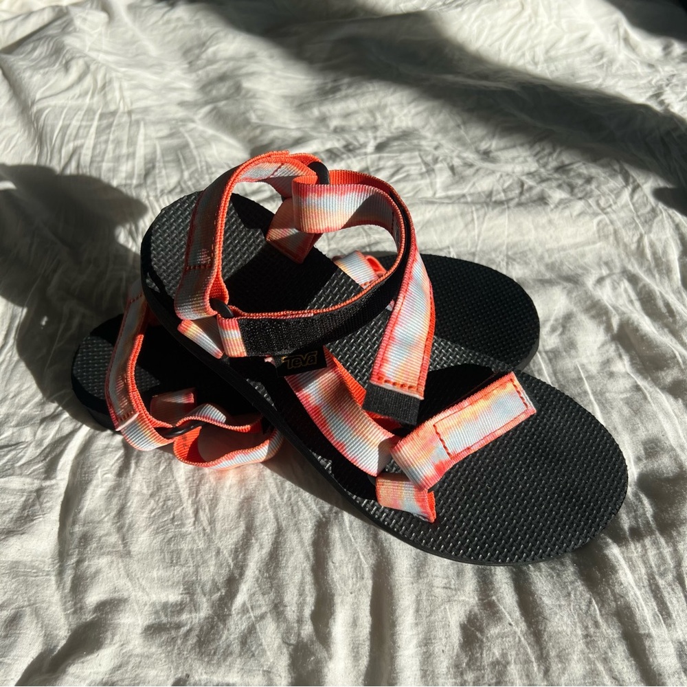 Teva Black and Orange Sandals